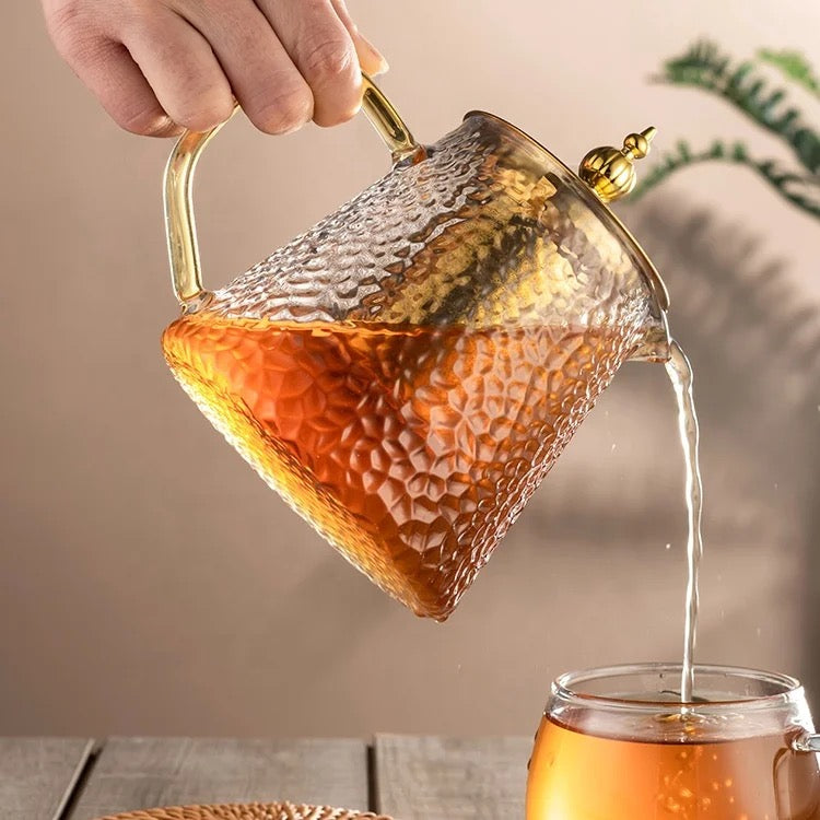 Glass gold teapot