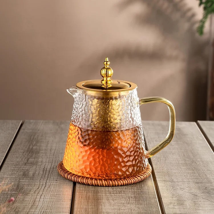 Glass gold teapot