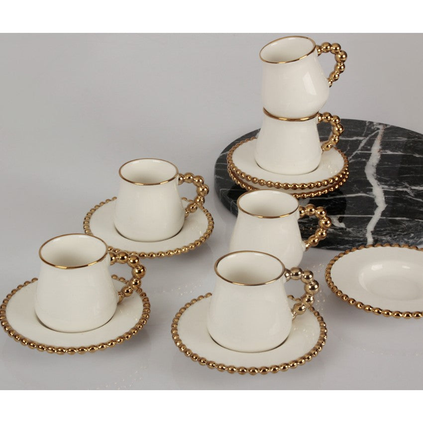 Gold beaded coffee cups