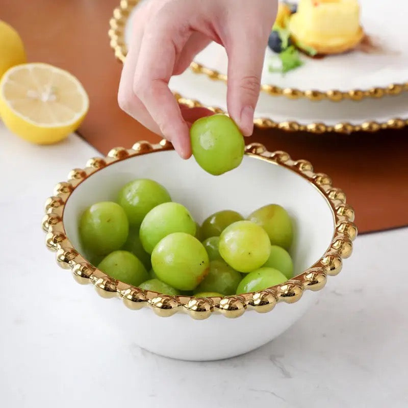 White and gold edge round bowl